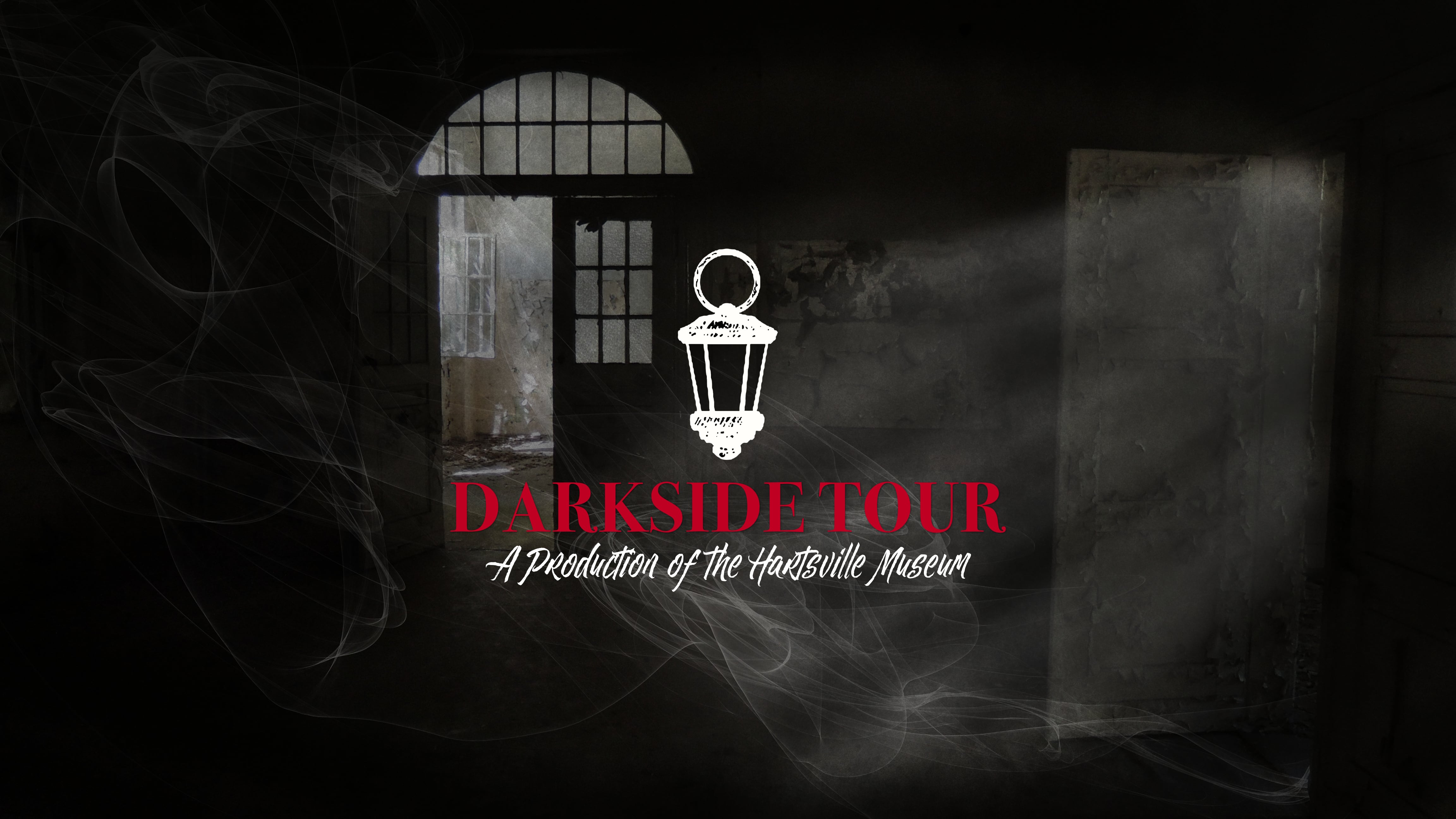 Darkside Tour banner image with a spooky background of a dark room with, a backlit door, and smoke.